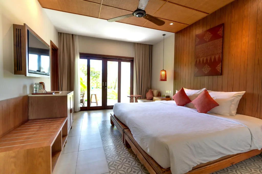 Comfortable 3 Bed AC Room featuring three cozy beds, air conditioning, clean interiors, modern furnishings, and a relaxing stay environment.